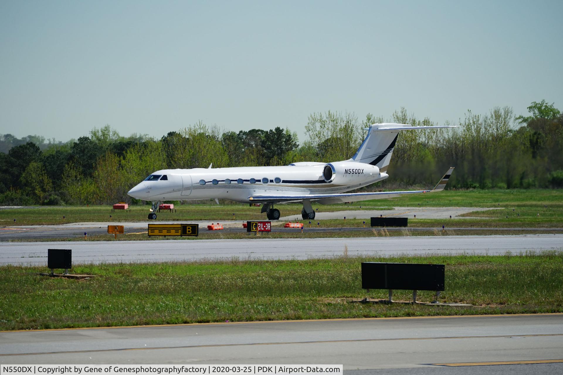 N550DX, 2015 Gulfstream Aerospace GV-SP (G550) C/N 5517, Just starting its take off roll at Dekalb Peachtree Airport, today, 3/25/2020.