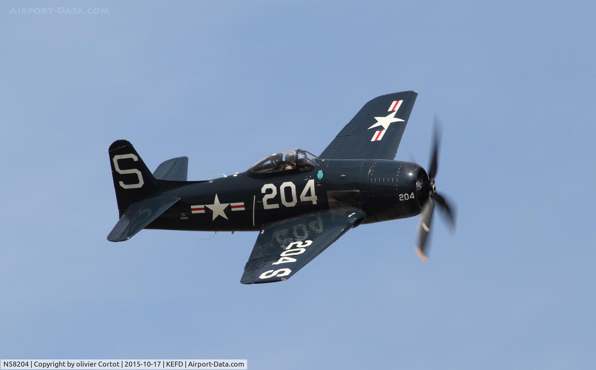 N58204, 1946 Grumman F8F-1 Bearcat C/N D.527, flying over Houston