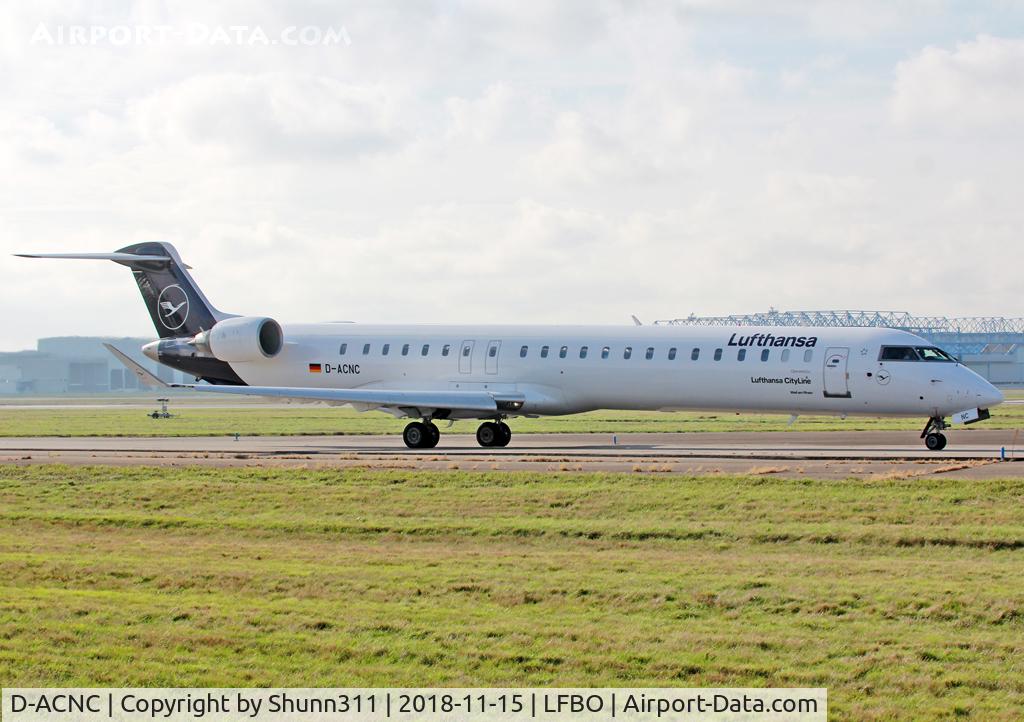 D-ACNC, 2009 Bombardier CRJ-900LR (CL-600-2D24) C/N 15236, Taxiing holding point rwy 14L in new c/s