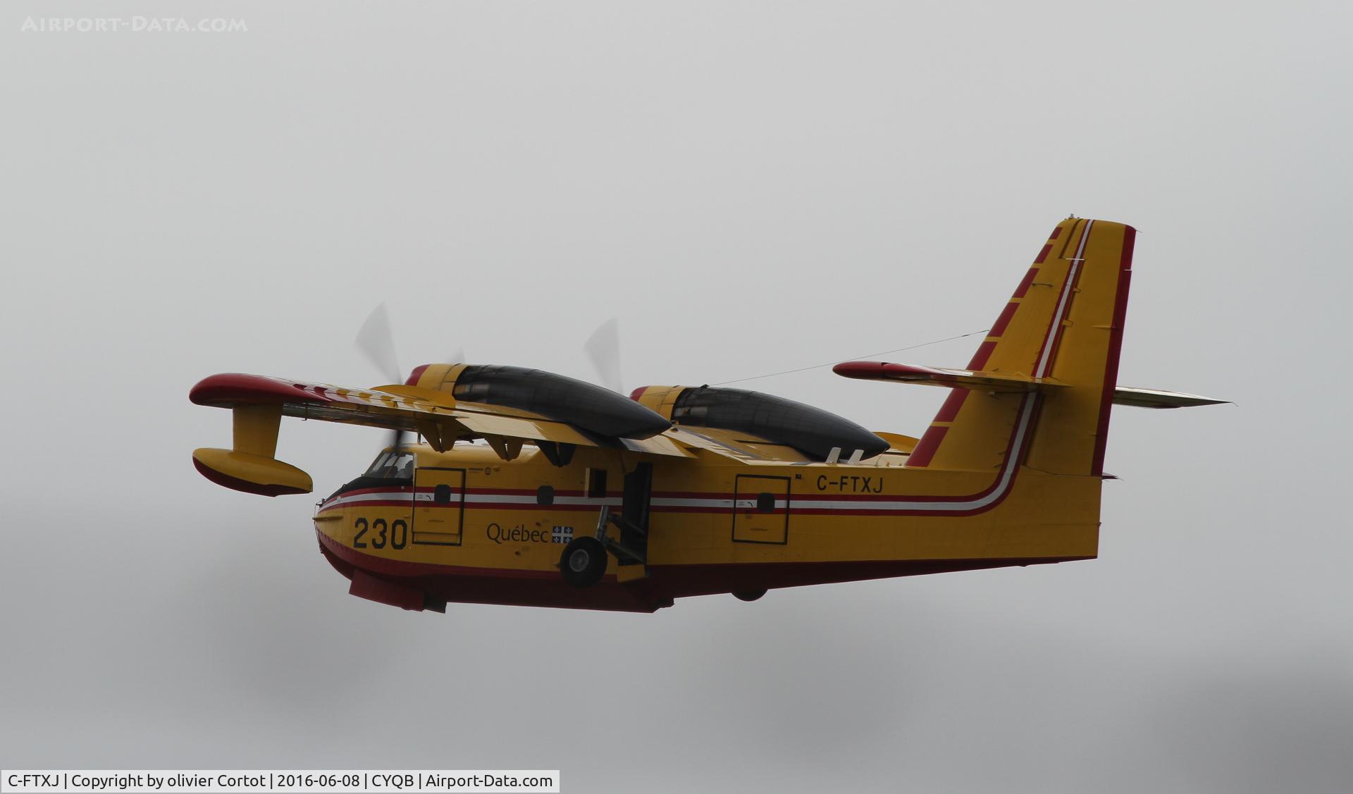 C-FTXJ, 1970 Canadair CL-215-I (CL-215-1A10) C/N 1017, taking off, cloudy day,  june 2016