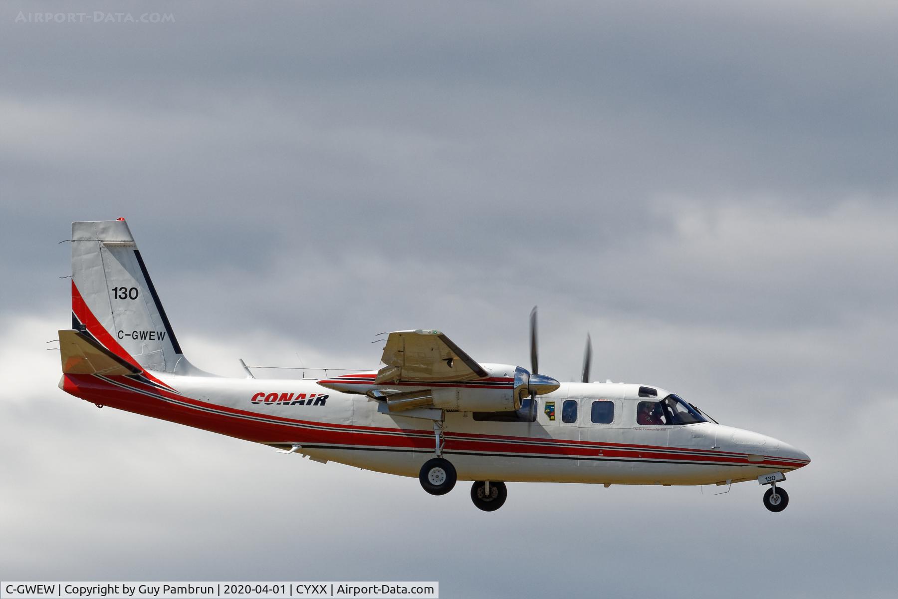 C-GWEW, 1973 Aero Commander 690 C/N 11057, Short final for 07