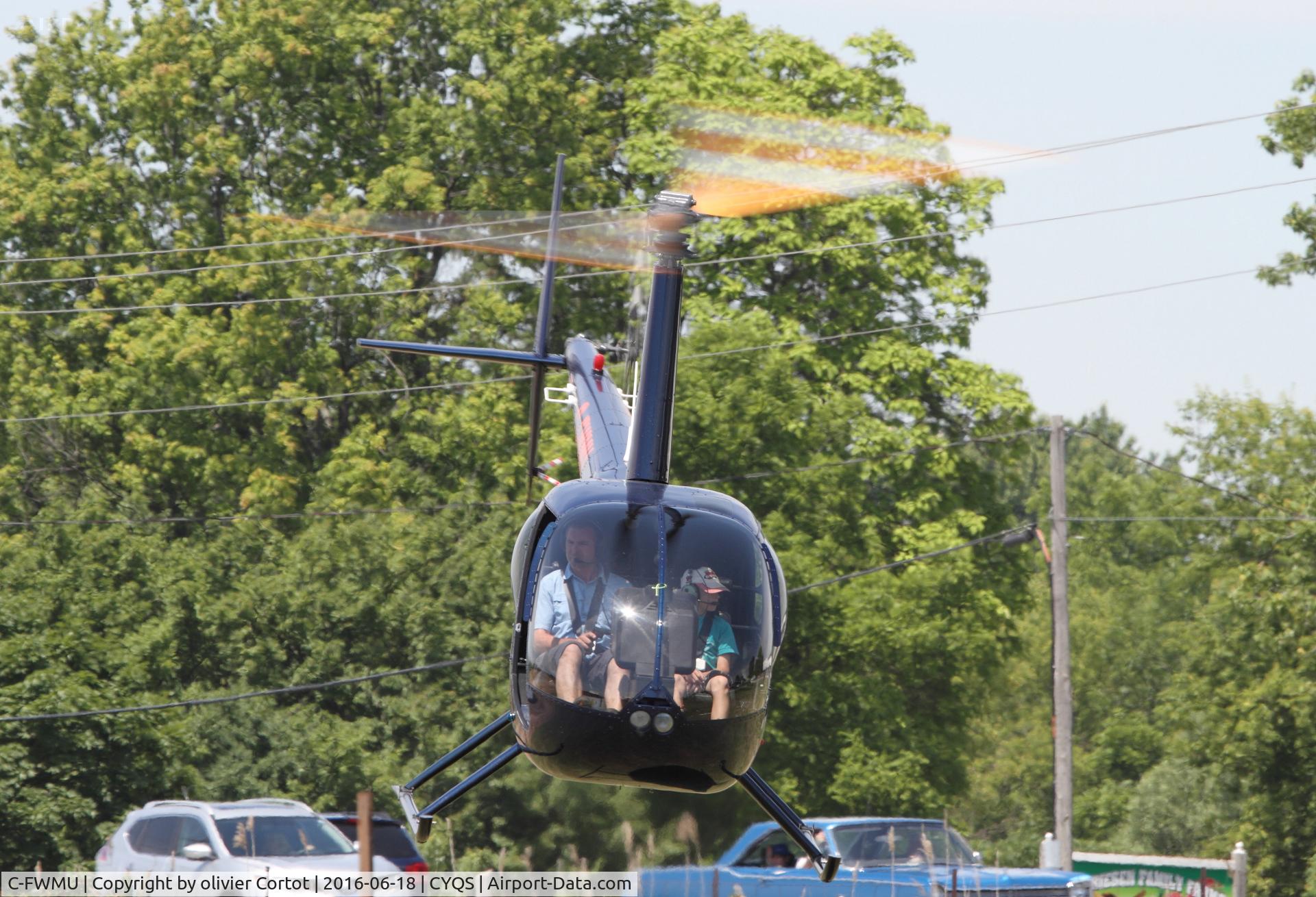C-FWMU, 2009 Robinson R44 C/N 2023, taking off, 2016