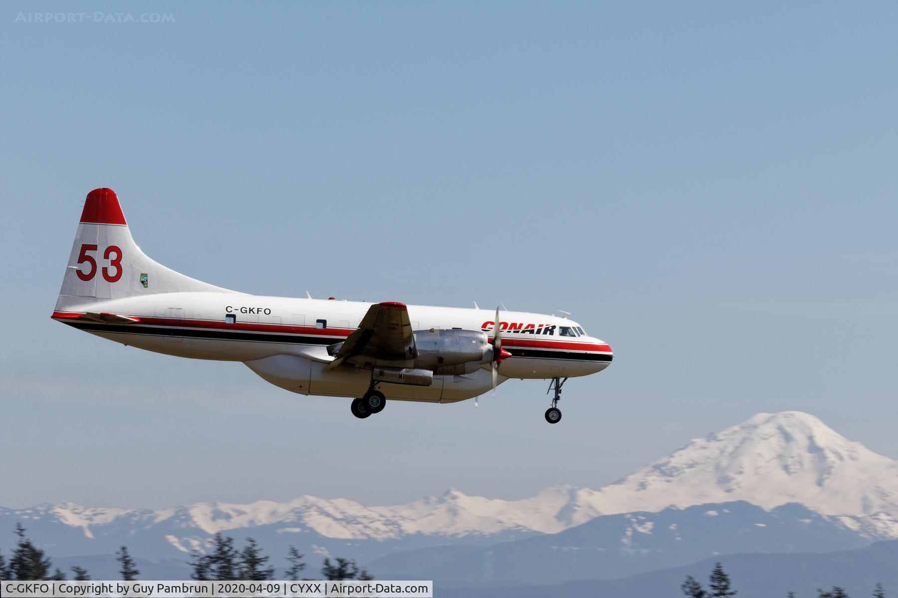 C-GKFO, 1953 Convair CV-580 C/N 78, Landing on 19 with Mt.Baker, Wa in the background
