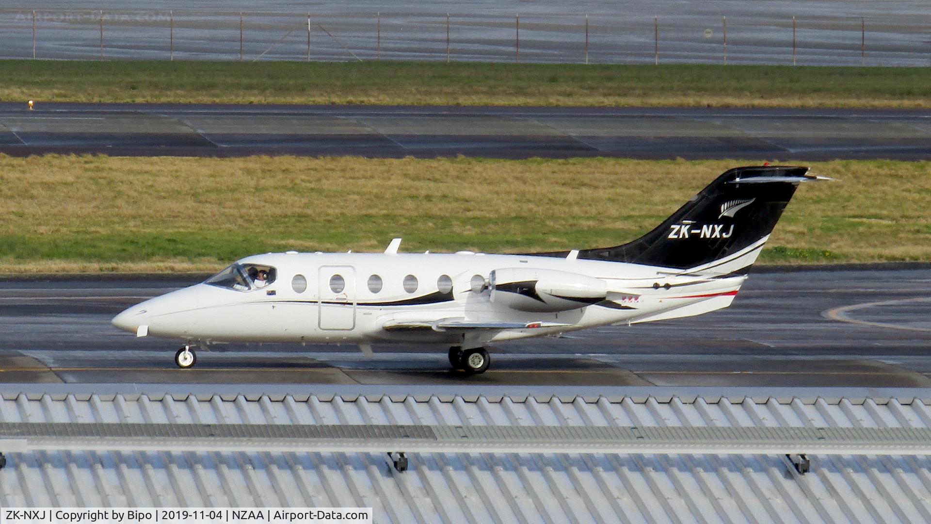 ZK-NXJ, 1998 Raytheon Beechjet 400A C/N RK-210, Taxiing back to base after an air ambulance mission.