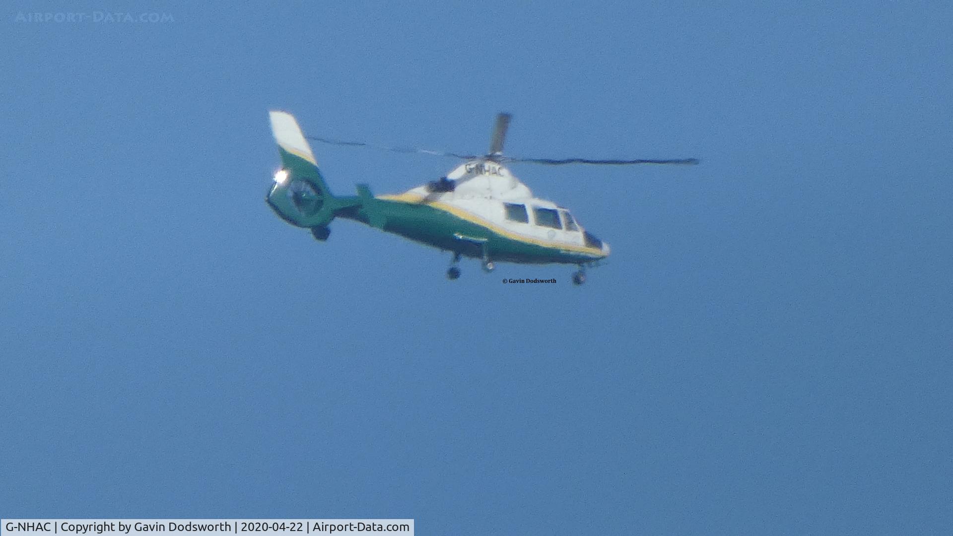 G-NHAC, 1996 Eurocopter AS-365N-2 Dauphin 2 C/N 6497, Helimed 63 flying over Darlington whilst returning to Teesside International Airport on Wednesday 22nd April 2020
