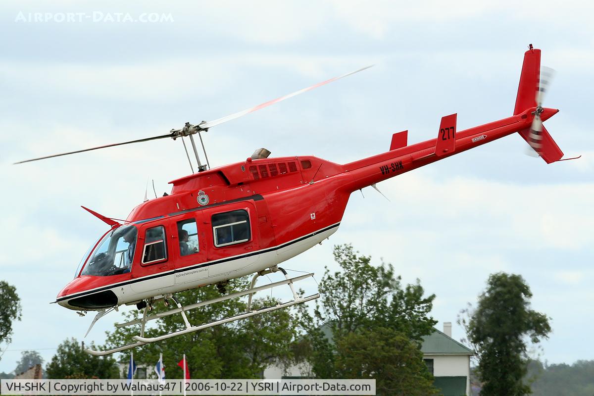 VH-SHK, 1979 Bell 206L-1 LongRanger II C/N 45323, Port-side view of ‘JoyFlight’ Sydney Helicopters Bell 206L-1 LongRanger helicopter VH-SHK Cn 45323 Firebird 277 departing RAAF Base Richmond YSRI NSW during the Australian Defence Force Airshow on 22Oct2006.