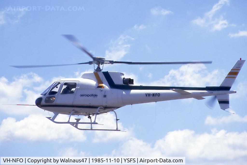 VH-NFO, 1985 Eurocopter AS-350B Ecureuil Ecureuil C/N 1823, Port side view of New AS-350B helicopter VH-NFO Cn 1823, flying at the Schofields Air Show (held at HMAS Nirimba YSFS NSW) on 10Nov1985. (This helo was First Registered on 09Oct1985 and was later Operated by the Forestry Commission of NSW).