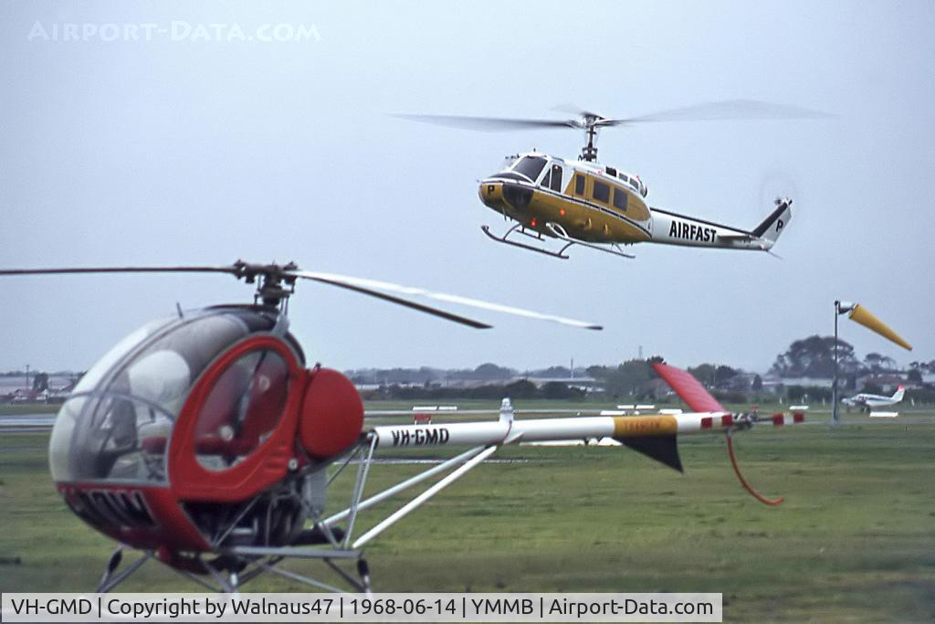 VH-GMD, Hughes 269A C/N 73-0258, Low Res view of Jayrow Hughes 269A helicopter VH-GMD (Cn 73-0258) at the Jayrow Helicopter Base at Moorabbin YMMB on 14Jun1968. Airfast Bell 205 VH-NSP Cn 30032  is about to land in the background.