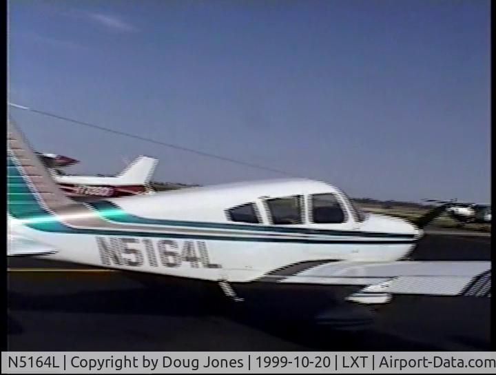N5164L, 1967 Piper PA-28-180 C/N 28-4449, I rented this plane Oct 20 1999. My buddy Augie and I flew it for about an hour. It flew fine but it was just an old rental plane. The Plane photo is a still from a 8mm Sony digital video tape. I have quite a lot of flying video in this plane.