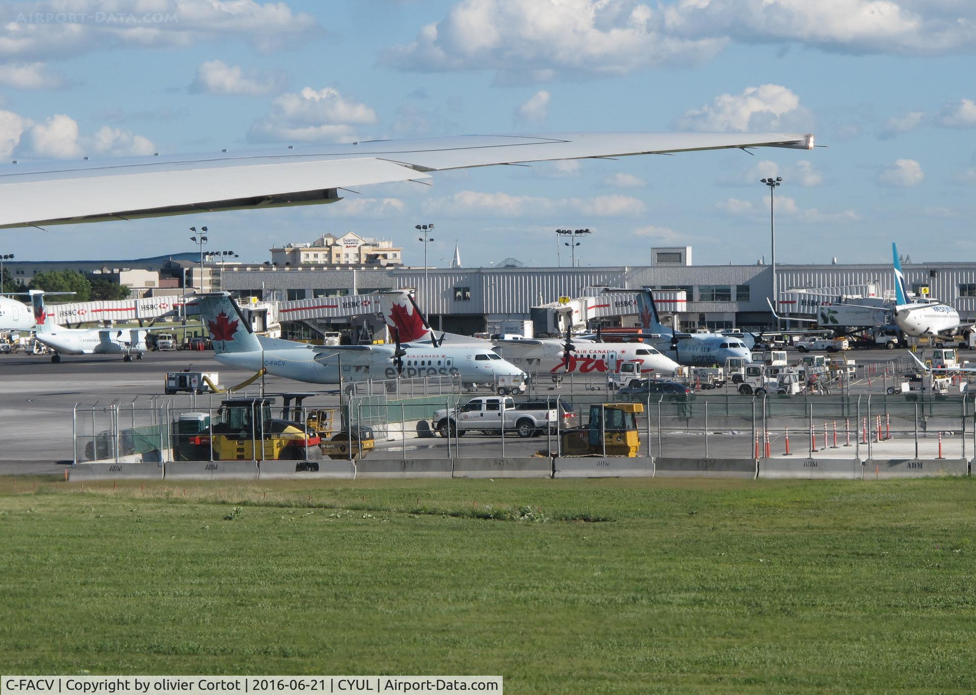 C-FACV, 1991 De Havilland Canada DHC-8-311 Dash 8 C/N 278, with others at Montreal airport in 2016