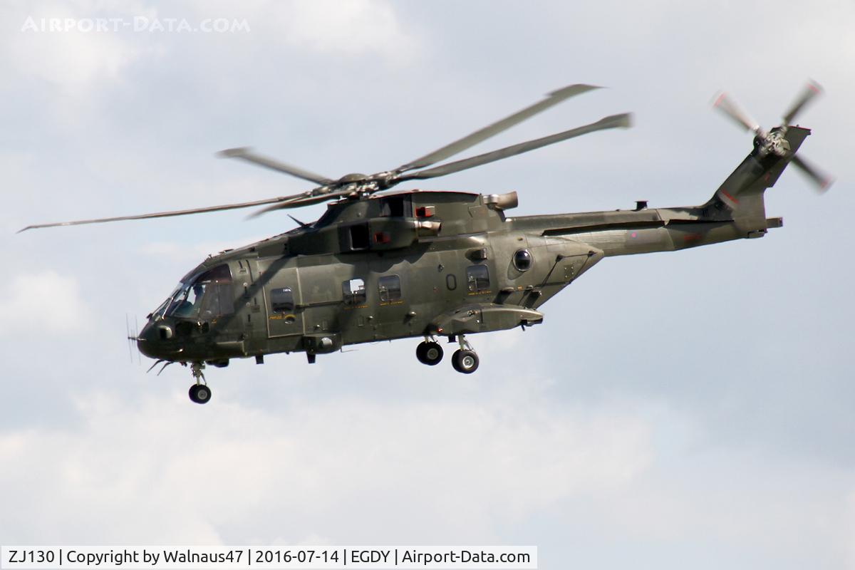 ZJ130, 2001 AgustaWestland Merlin HC3i (EH101) C/N 50169, Port-side view of UK Royal Navy Agusta-Westland Merlin HC3i ZJ130 Cn 50169 departing NAS Yeovilton EGDY on 14Jul2016. (Incidental sighting after visiting the RN Fleet Air Arm Museum.)
