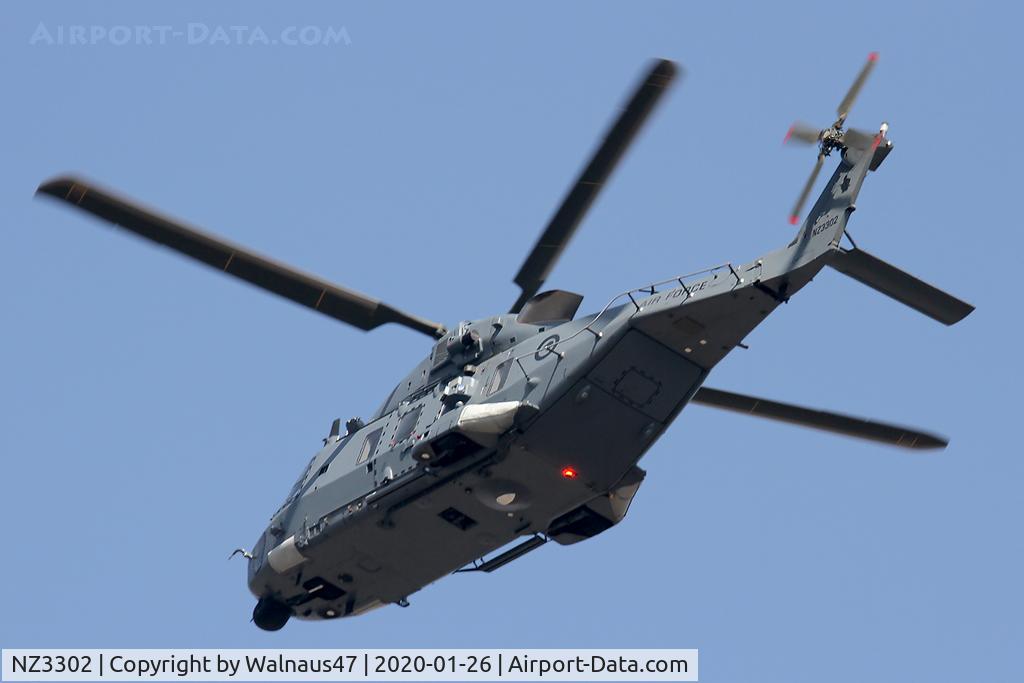 NZ3302, 2011 NHI NH-90 TTH Caiman C/N 1206/TNZA02, Low res Port rear under-side view of RNZAF NH Industries NH-90 TTH NZ3302 Cn 1206, taken over Isaacs Canberra ACT on Australia Day, 26Jan2020. The helo was departing on a regular Bushfire support mission to the South-West of Canberra.