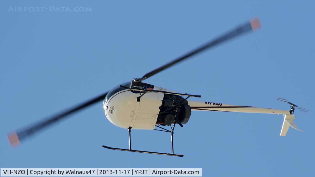 VH-NZO, Robinson R22 Beta C/N 4362, Port underside view of white livery Robinson R22 Beta VH-NZO Cn 4362 transiting at Jandakot YPJT, Perth, West Australia, on 17Nov2013.