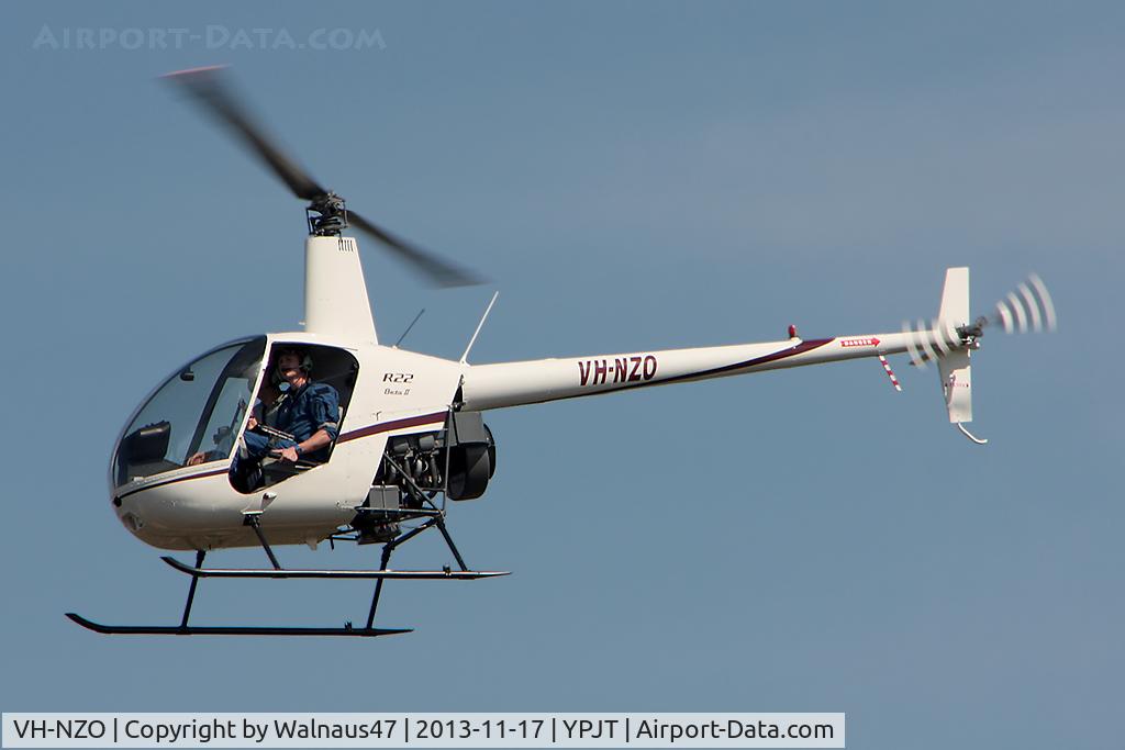 VH-NZO, Robinson R22 Beta C/N 4362, Port side view of white livery Robinson R22 Beta VH-NZO Cn 4362 transiting at Jandakot YPJT, Perth, West Australia, on 17Nov2013.