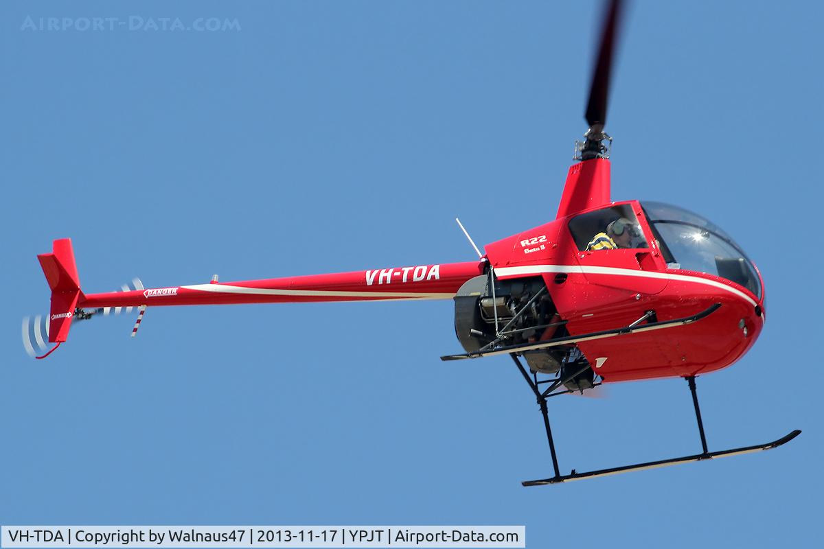 VH-TDA, 2012 Robinson R22 C/N 4584, Stbd side view of red livery Robinson R22 Beta VH-TDA Cn 4584 transiting at Jandakot YPJT, Perth, West Australia, on 17Nov2013.
