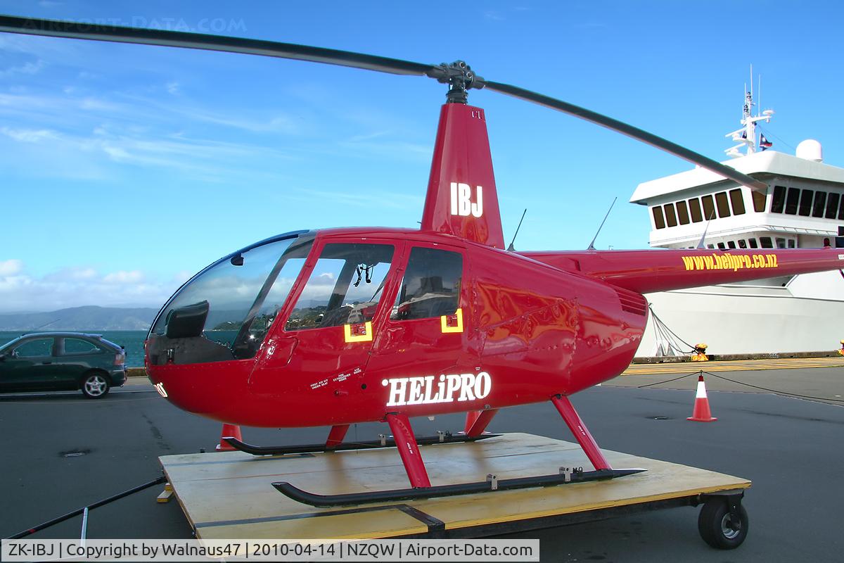 ZK-IBJ, Robinson R44 C/N 1008, Close-cropped front Portside view of Helipro Robinson R44 Raven ZK-IBJ Cn 1008 parked on a ground handling platform at NZQW Wellington - Queens Wharf Heliport NZ - on 14Apr2010.