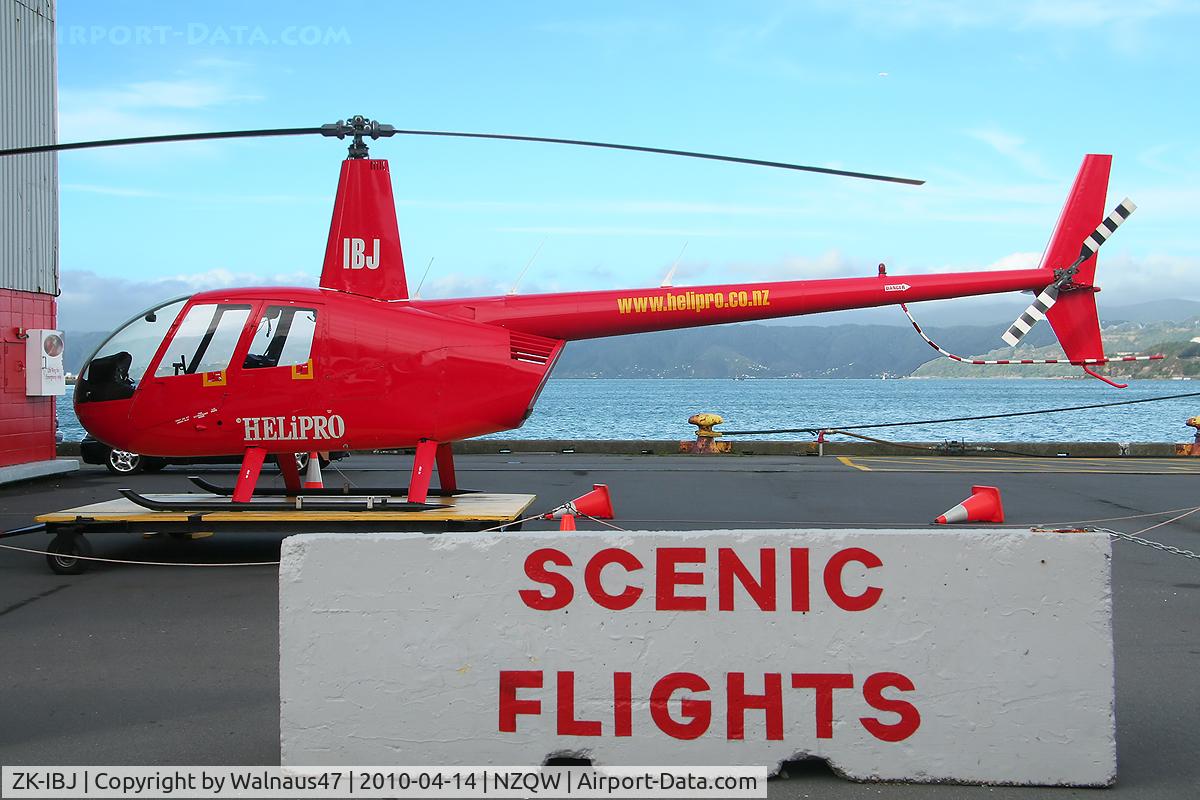 ZK-IBJ, Robinson R44 C/N 1008, Rear Portside view of Helipro Robinson R44 Raven ZK-IBJ Cn 1008 parked on a ground handling platform at NZQW Wellington - Queens Wharf Heliport NZ - on 14Apr2010.