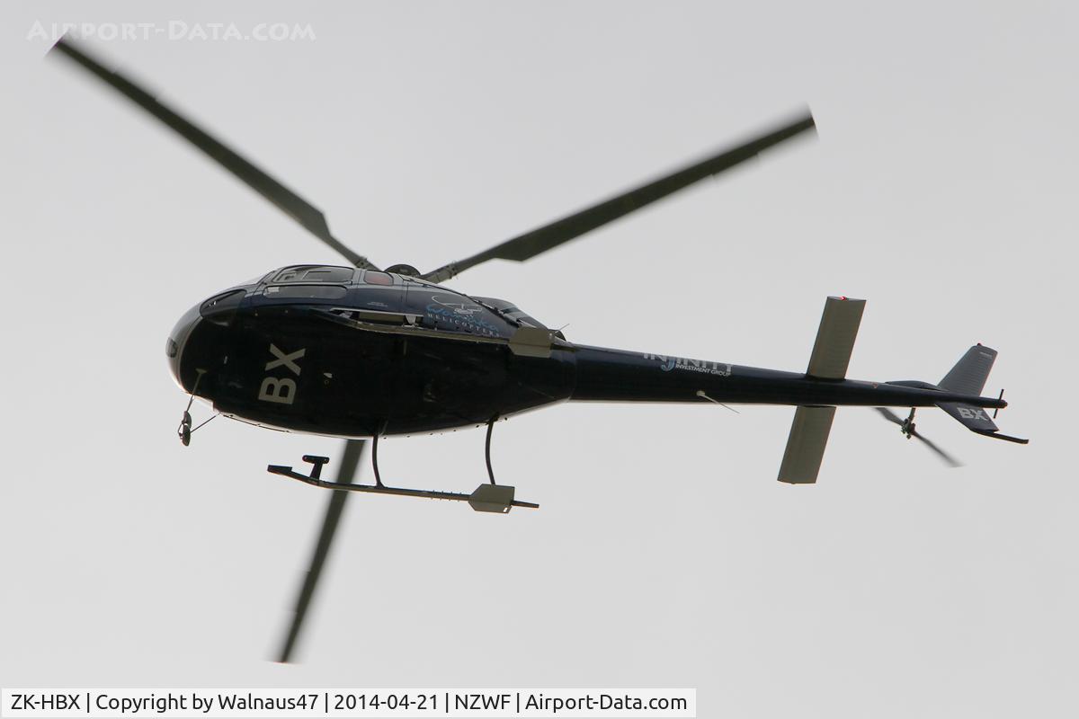 ZK-HBX, Aerospatiale AS-350BA Ecureuil C/N 1391, Underside view of Wanaka Helicopters Aerospatiale AS-350BA Ecureuil ZK-HBX Cn 1391 arriving at Wanaka NZWF 21Apr2014, during Warbirds Over Wanaka (WOW) 2014.