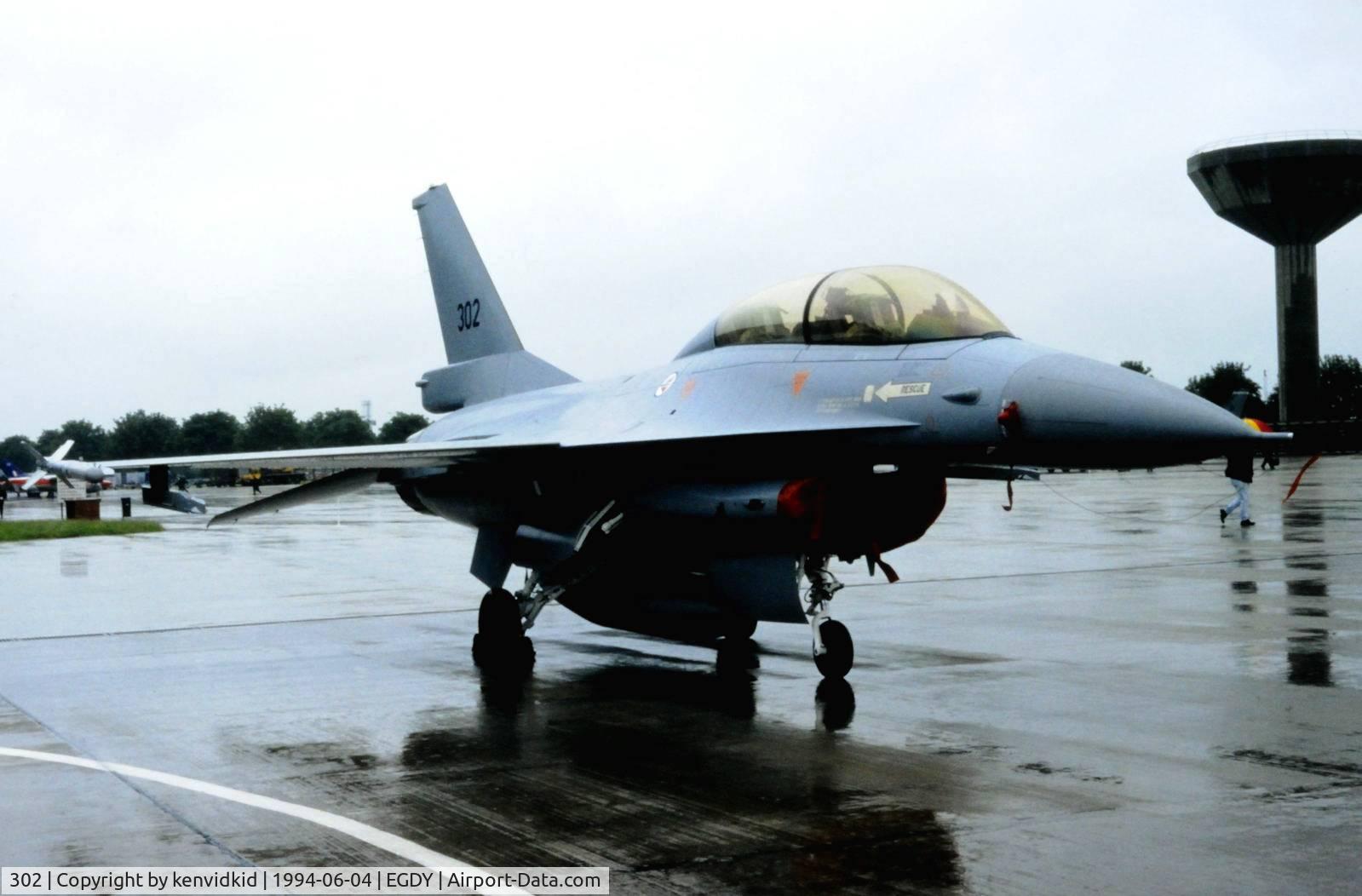 302, Fokker F-16B Fighting Falcon C/N 6L-2, On static display at the RNAS Yeovilton 1994 50th Anniversary of D Day photocall. It rained all day.