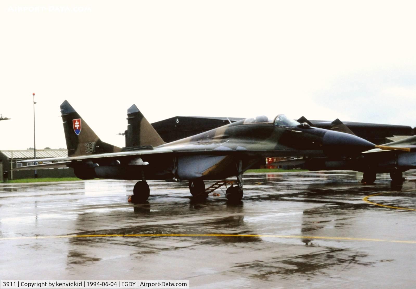 3911, Mikoyan-Gurevich MiG-29AS C/N 2960532039, On static display at the RNAS Yeovilton 1994 50th Anniversary of D Day photocall. It rained all day.