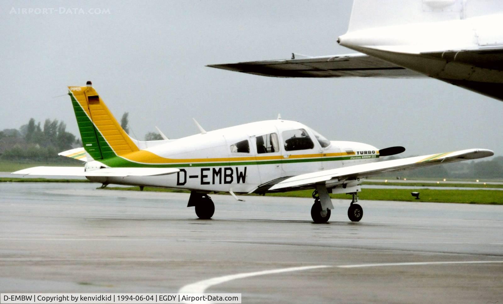 D-EMBW, 1977 Piper PA-28R-201T Cherokee Arrow III C/N 28R-7703394, On static display at the RNAS Yeovilton 1994 50th Anniversary of D Day photocall. It rained all day.