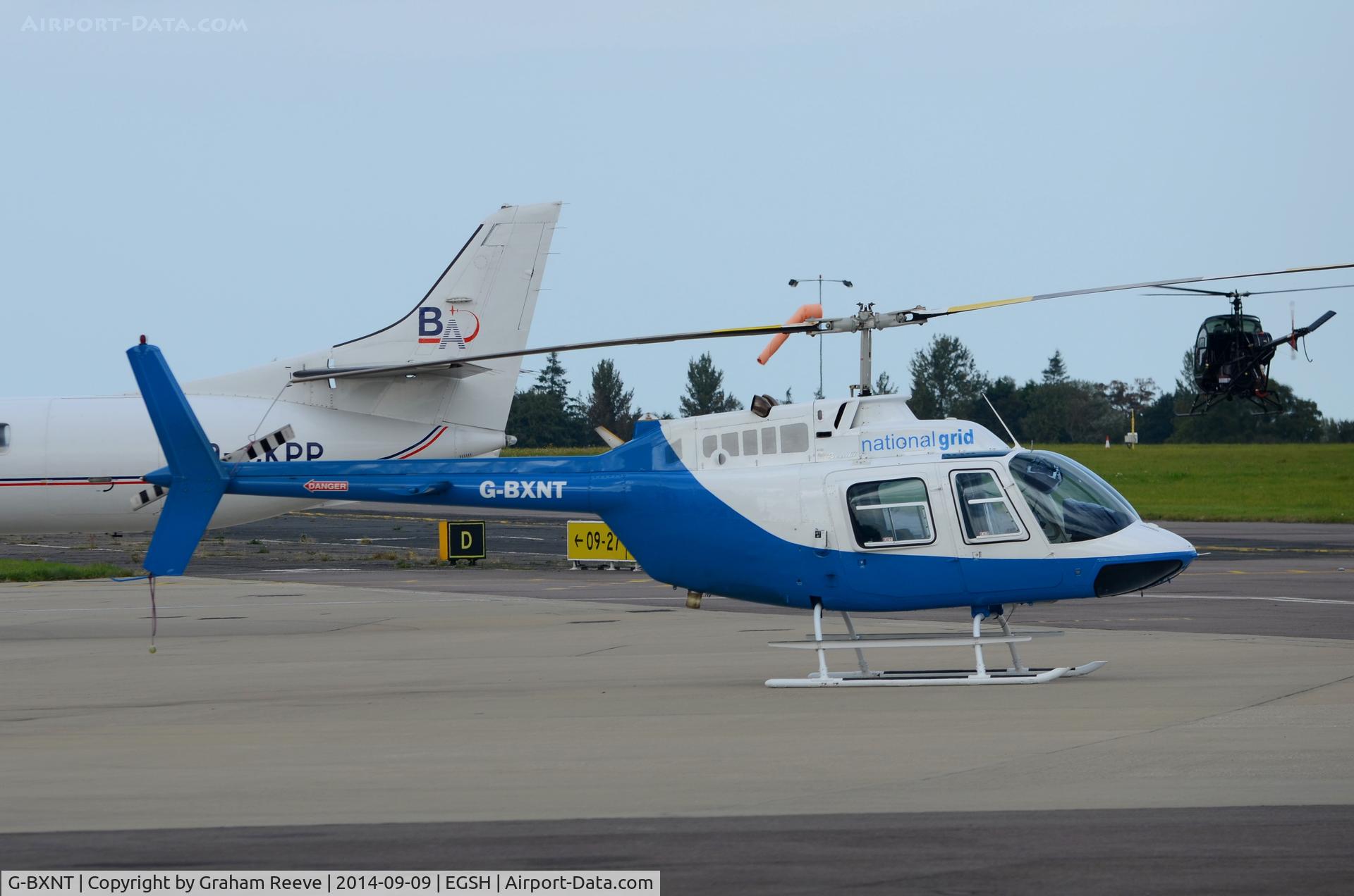 G-BXNT, 1977 Bell 206B JetRanger III C/N 2398, Parked at Norwich.