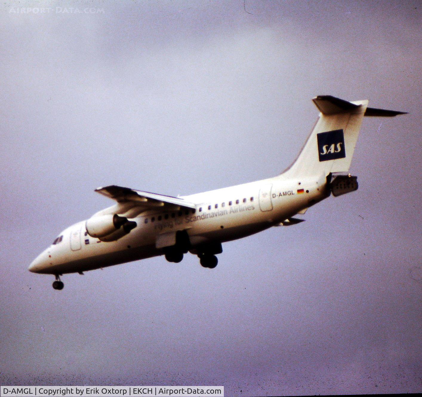 D-AMGL, 1986 British Aerospace BAe.146-200 C/N E2055, D-AMGL landing rw 22L
Scanned slide