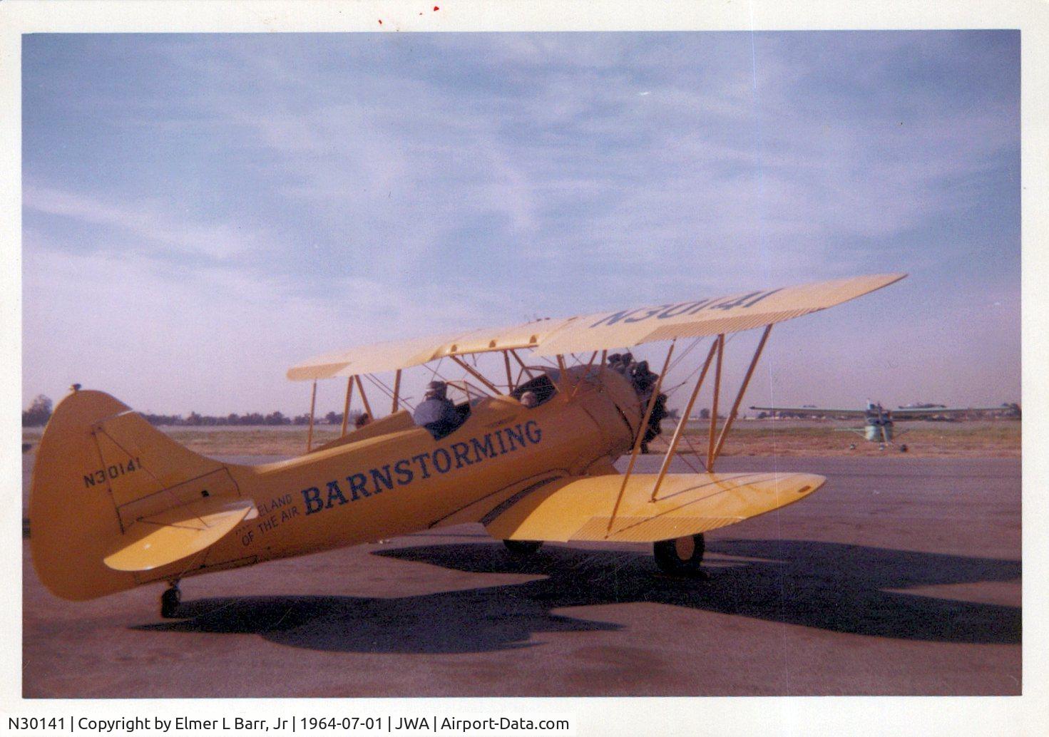 N30141, 1940 Waco UPF-7 C/N 5538, Photo taken on July 1, 1964, giving rides for a penny a pound!!  My brother and I were 9 and 8 years of age, could barley see out, our first flight in any kind of an airplane. Photo taken by our father