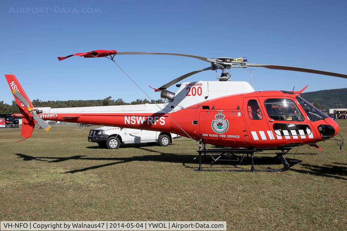 VH-NFO, 1985 Eurocopter AS-350B Ecureuil Ecureuil C/N 1823, Stbd-side view of NSW RFS AS 350B2 Ecureuil VH-NFO Cn 1823 at Albion Park Airport YWOL near Wollongong NSW, on 04May2014. The occasion was the 2014 Wings Over Illawarra (WOI) Airshow. This helo is operated by the NSW Rural Fire Service as Firebird 200.