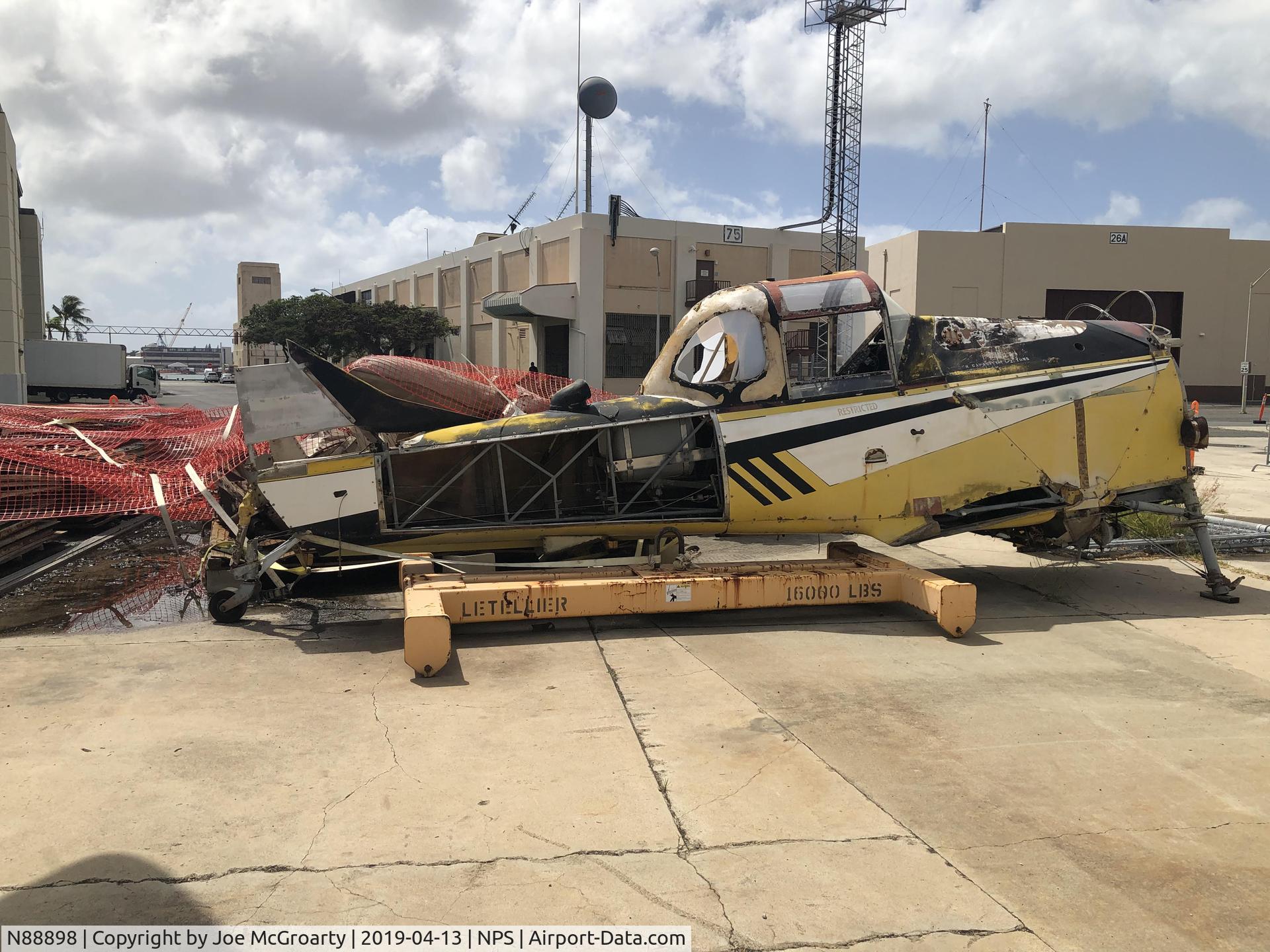 N88898, 1978 Emair MA-1B Diablo C/N 040, Shell of N88898 sitting in lot between Pearl Harbor Aviation Museum and Hangar 79, looking southeast.