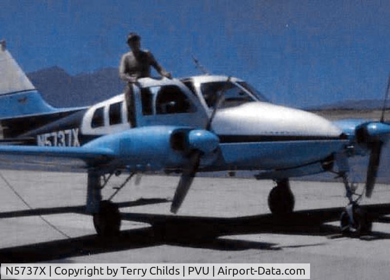 N5737X, Cessna 320 Skyknight C/N 320-0037, My grandfather, Ken Childs, when he owned this plane in 1968.  Original photo is owned by my uncle.