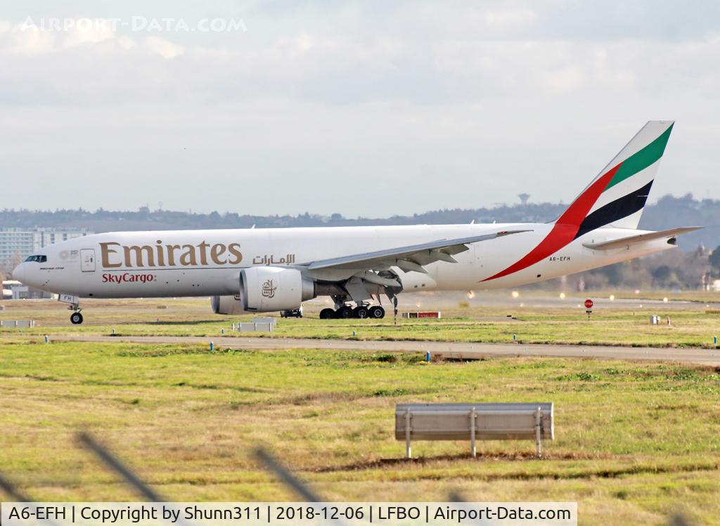 A6-EFH, 2012 Boeing 777-F1H C/N 35608, Taxiing to the Cargo aerea...
