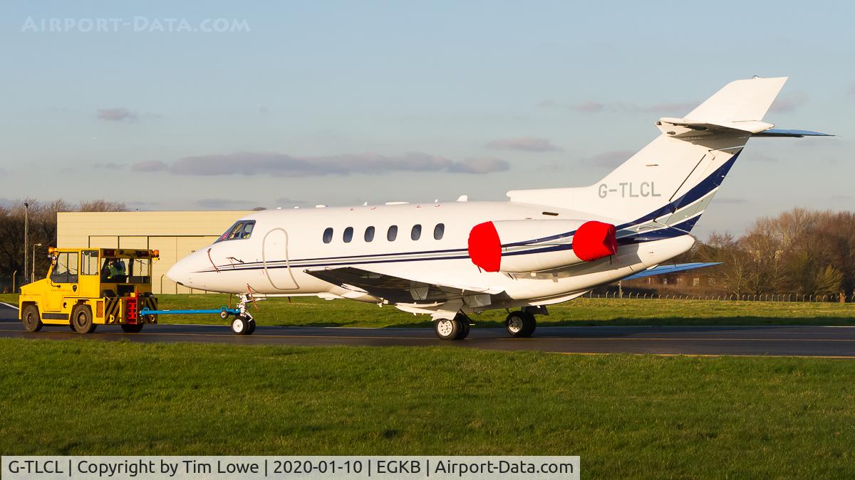G-TLCL, 2006 Raytheon Hawker 800XP C/N 258783, Being towed to the Main Apron.