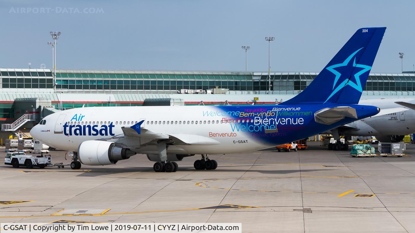 C-GSAT, 1991 Airbus A310-308 C/N 600, Pushing back to be tugged to the Air Transat Hangar.