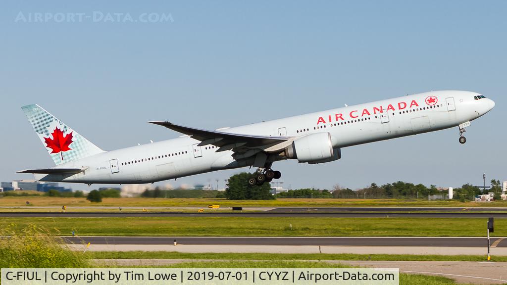 C-FIUL, 2007 Boeing 777-333/ER C/N 35255, Departing on runway 23.