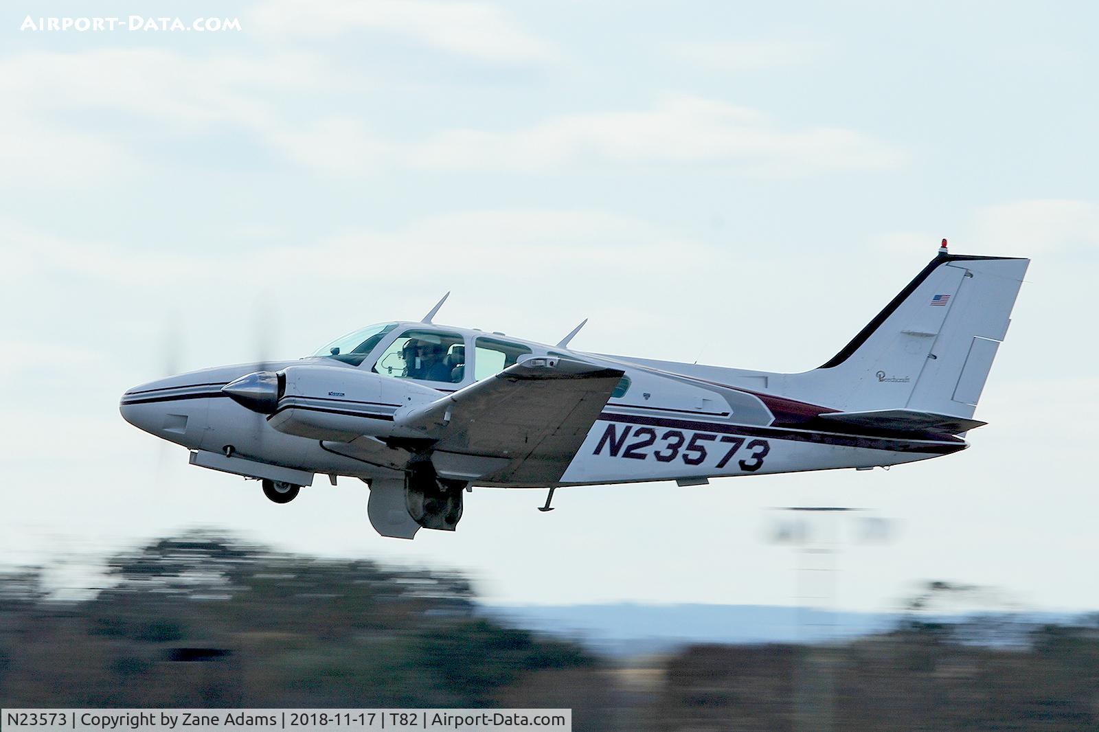 N23573, 1977 Beech 95-B55 (T42A) Baron C/N TC-2107, departing Fredericksburg, TX