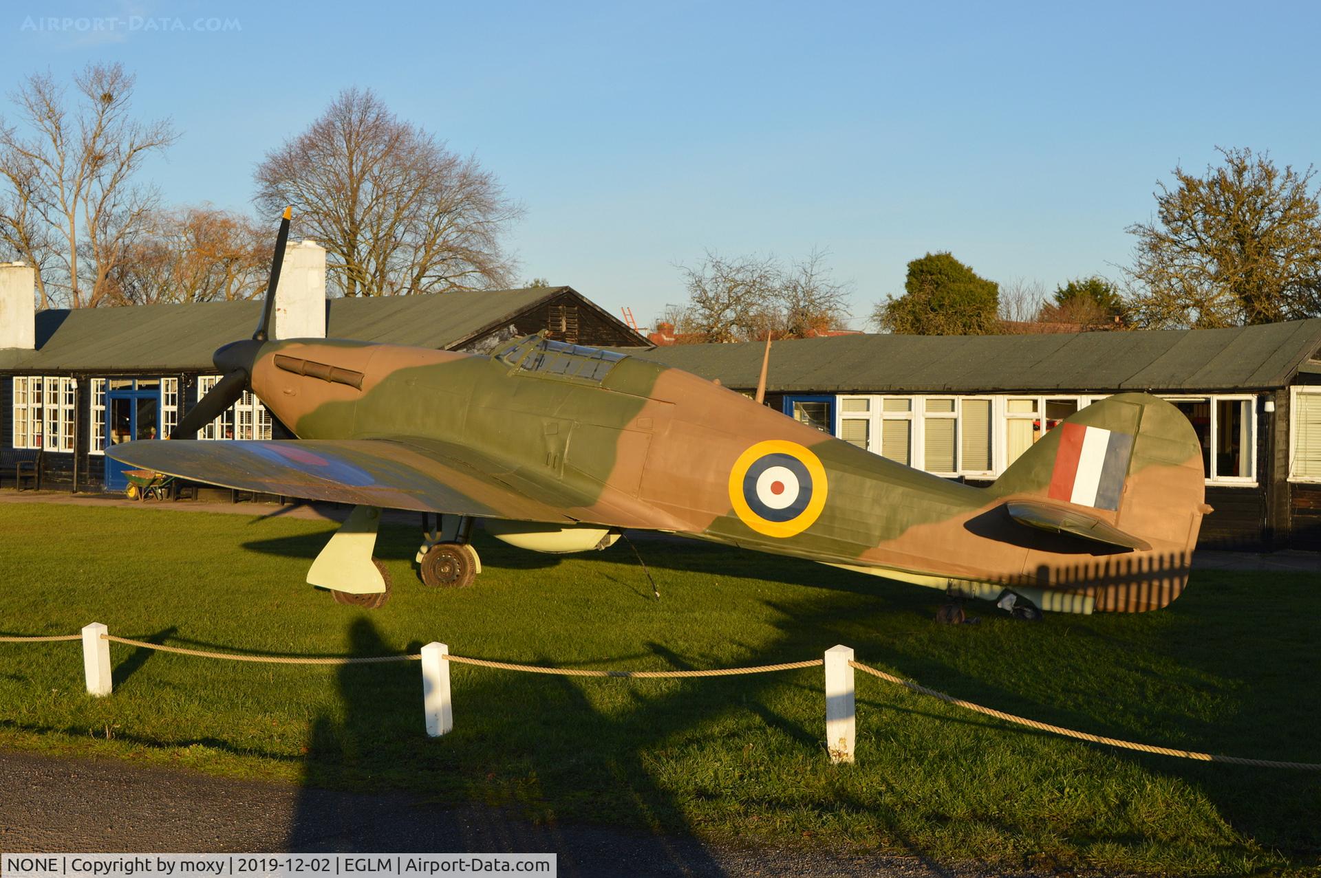 NONE, 2009 Waco / Roger Teagarden Cootie replica C/N unknown, Replica Hawker Hurricane at White Waltham by the clubhouse. It is normally stored at Shoot Aviation film studios at the southern corner of the aerodrome.