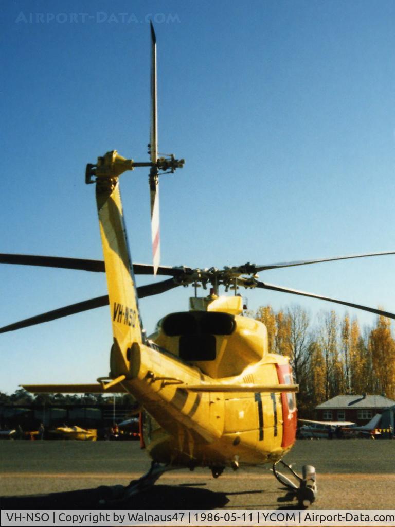 VH-NSO, 1998 Schempp-Hirth Discus 2b C/N 8, Rear view of parked NSCA Bell 412EP VH-NSO Cn 33089 (Code 11), at Cooma Airport YCOM NSW during the 'Snow Opening' Airshow on 11May1986. (Helo with NSCA 08MAR85 - 29MAY89 - later Sold to USA as N167EH.)