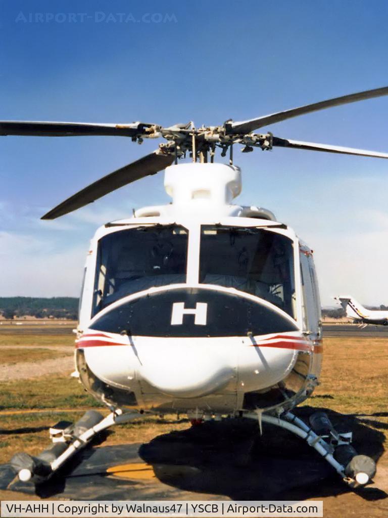 VH-AHH, Bell 412 C/N 33084, Front view of parked Bell 412 Helicopter VH-AHH Cn 33084 Code H, photographed at Canberra Airport in Mar 1987. Note pop-out floats on the skids. (Later Regd to NSCA as VH-NSV 16JUN87 - 28MAY89.) Previously Registered as N3172D in USA.