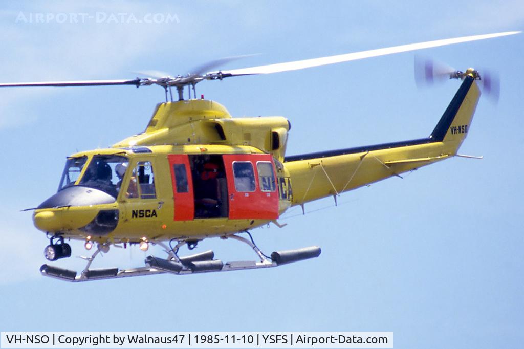 VH-NSO, 1998 Schempp-Hirth Discus 2b C/N 8, Front Port side view of NSCA Bell 412 VH-NSO Cn 33089 Code 11 flying past at Schofields/ NAS Nirimba (YSFS) on 10Nov1985. The helo is equipped with pop-out floats and a Nite-Sun searchlight. (Helo with NSCA 08MAR85 - 29MAY89 - later Sold to USA as N167EH.