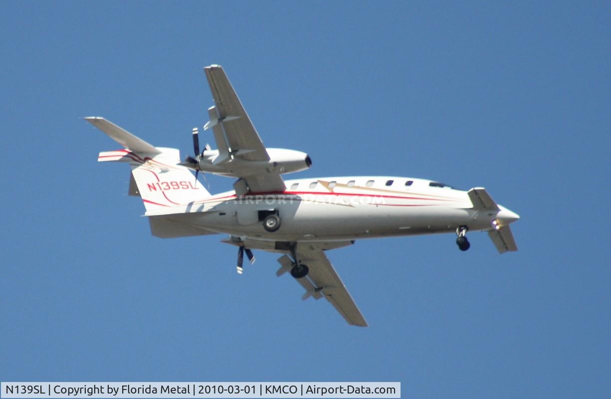 N139SL, 2005 Piaggio P-180 C/N 1104, MCO 2010