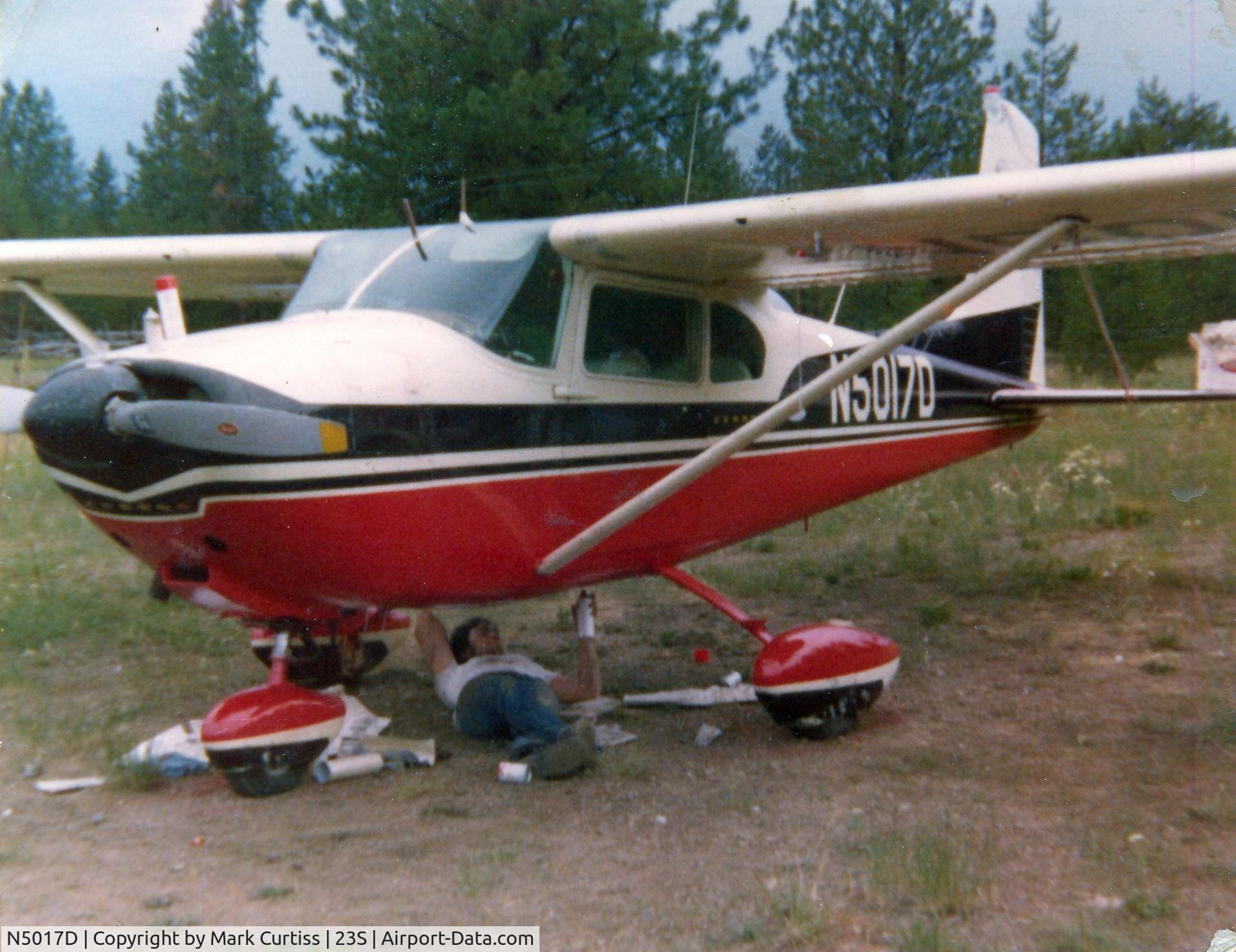 N5017D, 1958 Cessna 182A Skylane C/N 51117, Another shot of Dad's plane (spray can) painting over the pink with red.