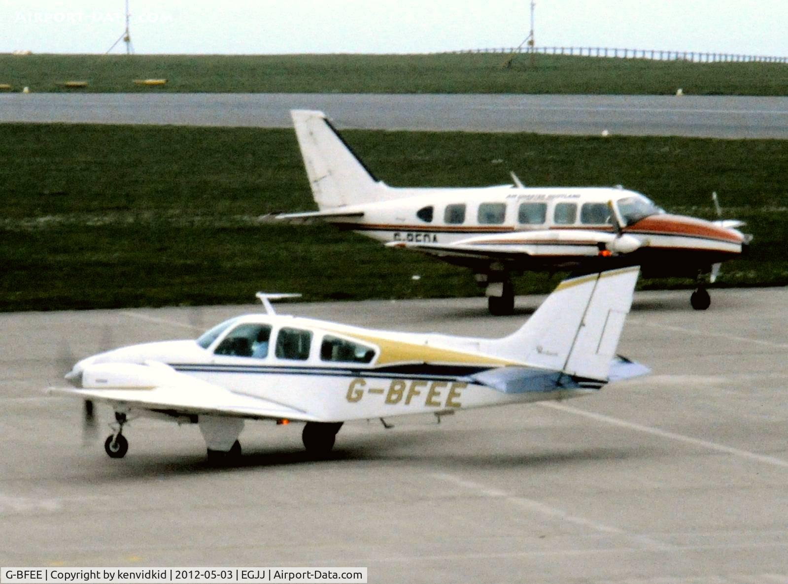 G-BFEE, 1973 Beech E-55 Baron Baron C/N TE-921, At Jersey airport early 1970's.
Scanned from slide.