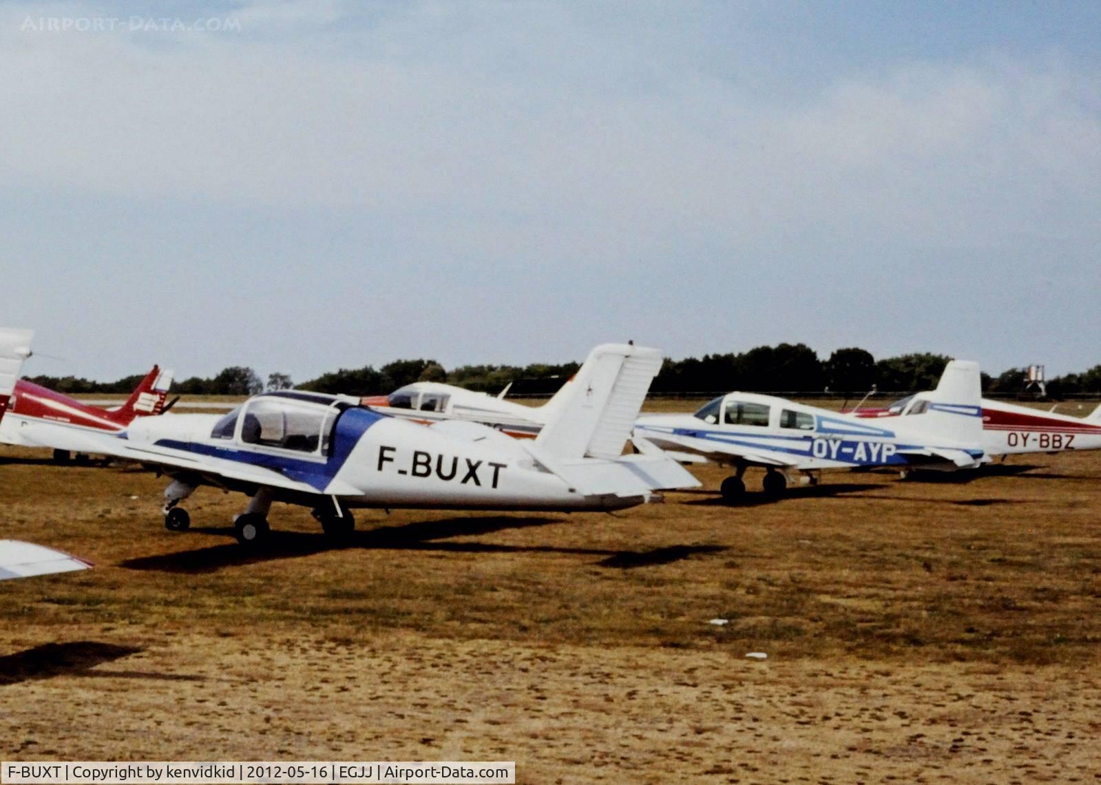 F-BUXT, Socata MS-880B Rallye Club C/N 2390, At Jersey airport early 1970's.
Scanned from slide.