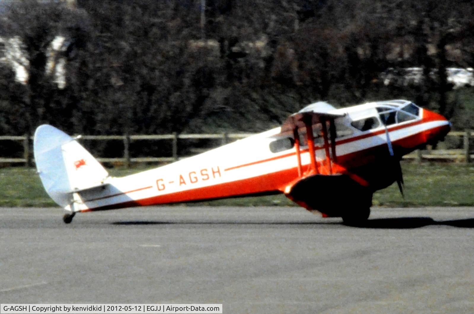 G-AGSH, 1945 De Havilland DH-89A Dominie/Dragon Rapide C/N 6884, At Jersey airport early 1970's.
Scanned from slide.