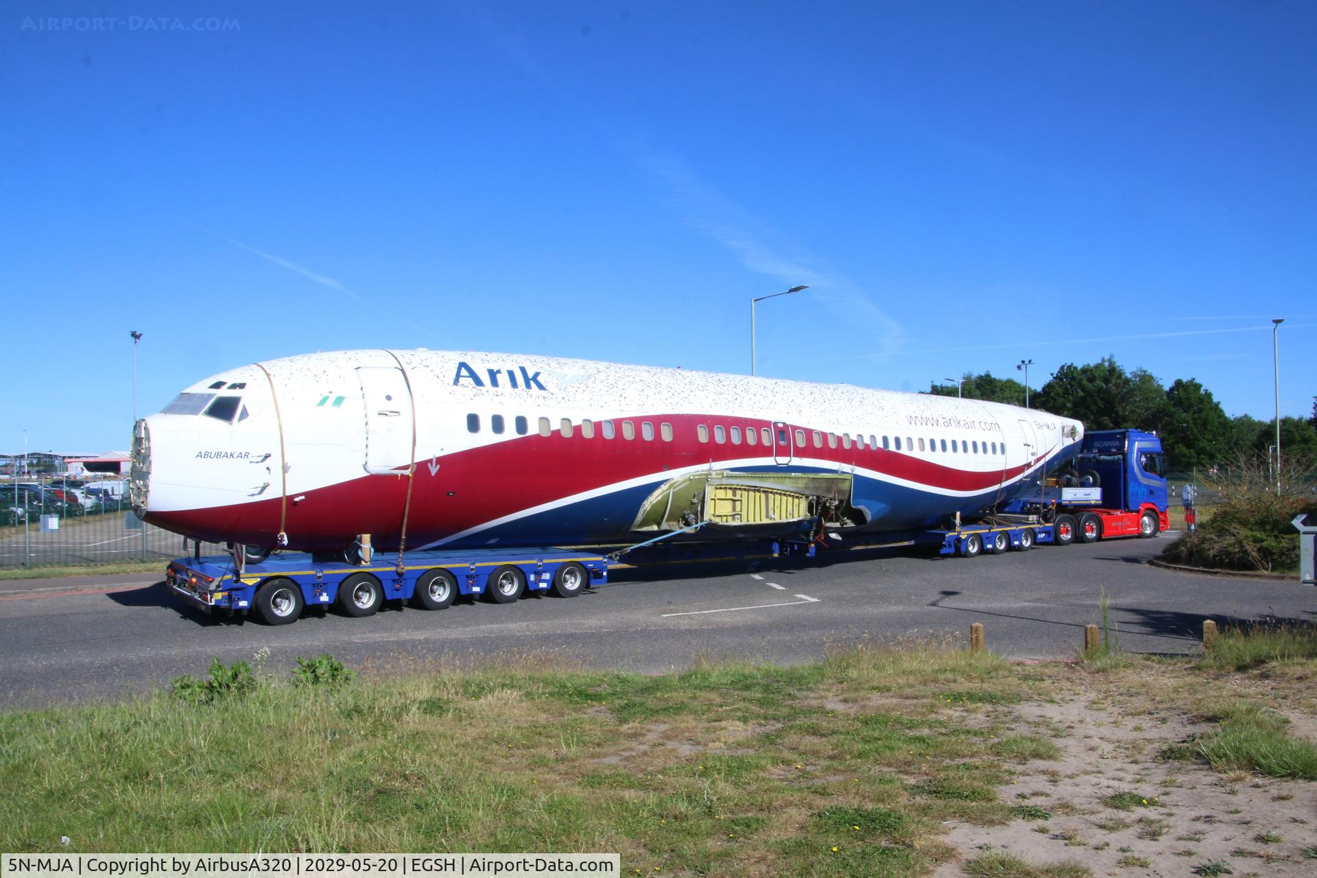 5N-MJA, 1989 Boeing 737-322 C/N 24454, Final journey, following being broken up at Norwich, seen departi ng being shipped to China for a new life