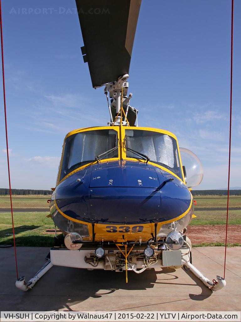 VH-SUH, 1976 Bell 214B-1 Biglifter Biglifter C/N 28017, Front view of McDermott Aviation Bell 214B-1 VH-SUH Cn 28017 HeliTack 339, at Latrobe Valley Airport (YLTV) Morwell on 22Feb2015. Fitted with a ‘HeliLift’ water/ fire retardant tank under the cabin.