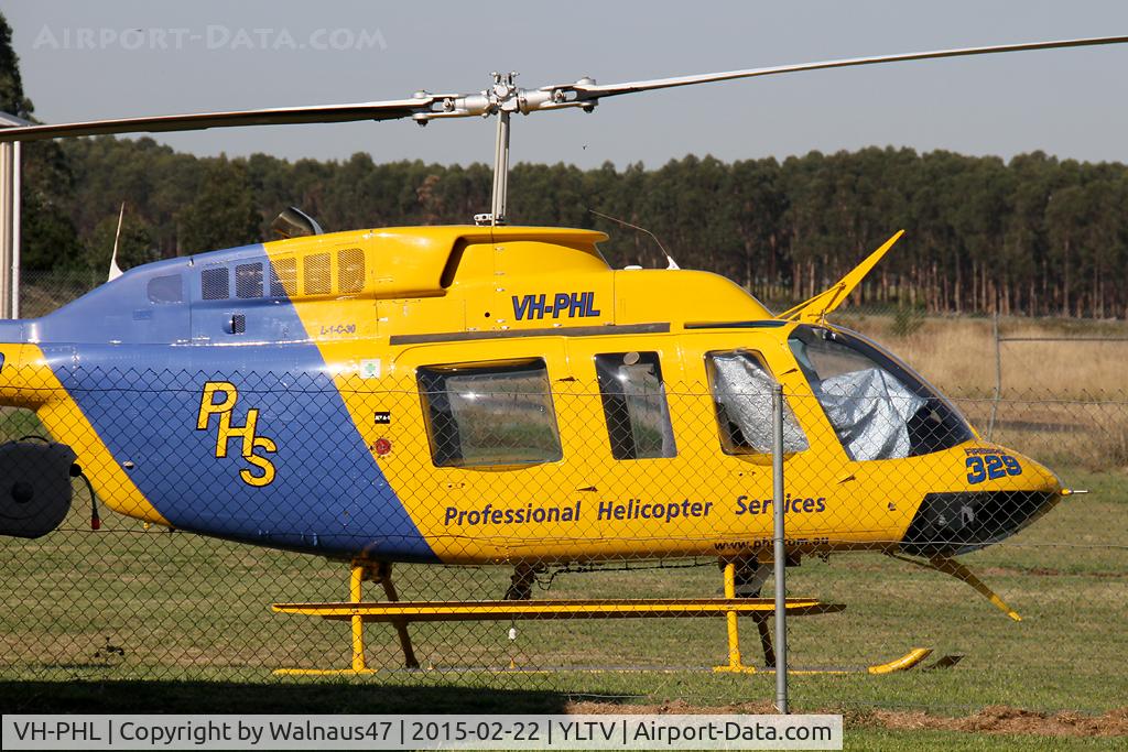 VH-PHL, 1978 Bell 206L-1 LongRanger II C/N 45177, Stbd view of front end of Blue/ Yellow Professional Helicopter Services (PHS) Bell 206L-1 LongRanger VH-PHL Cn 45177 parked at Latrobe Valley Airport (YLTV) Morwell on 22Feb2015. The helo has ‘bubble windows’ and wore Code Firebird 329.
