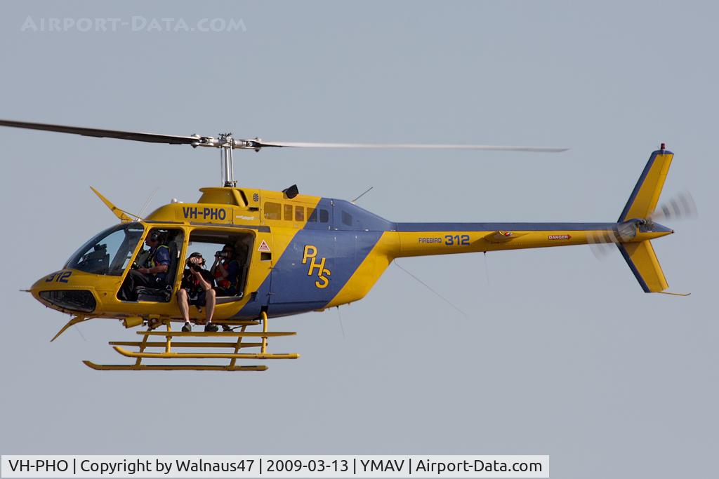 VH-PHO, 1976 Bell 206B JetRanger II C/N 1918, Professional Helicopter Services (PHS) Bell 206B JetRanger VH-PHO Cn 1918 (Firebird 312) takes three Photographers for a Photo Sortie at the 2009 Australian International Airshow at Avalon YMAV on 13Mar2009. They must be Airshow Accredited Photographers .