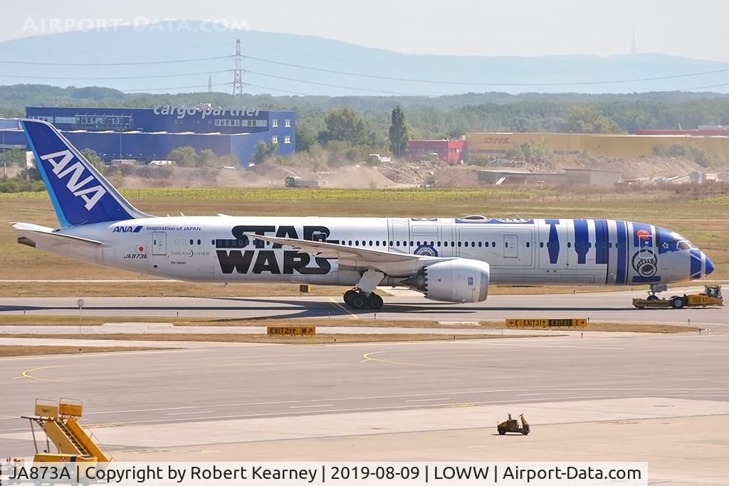 JA873A, 2015 Boeing 787-9 Dreamliner C/N 34530, Being towed to parking
